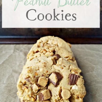 Ultimate Peanut Butter Cookies | A peanut butter lovers cookie! Ultimate Peanut Butter Cookies are filled with honey roasted peanuts, peanut butter chips and chunks of Reese's cups.