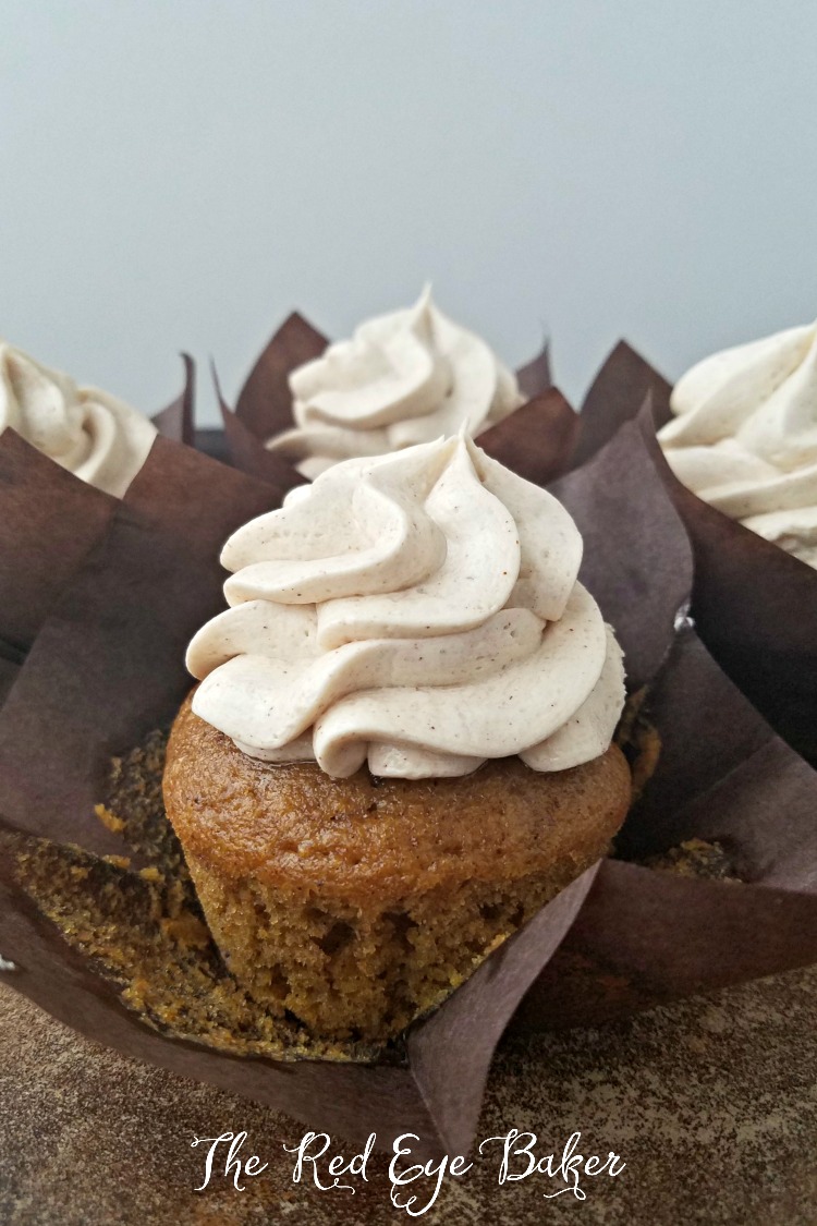 Pumpkin Cupcakes with Whipped Cinnamon Buttercream | Welcome fall into your kitchen with these perfectly spiced Pumpkin Cupcakes with delicious and fluffy Whipped Cinnamon Buttercream.